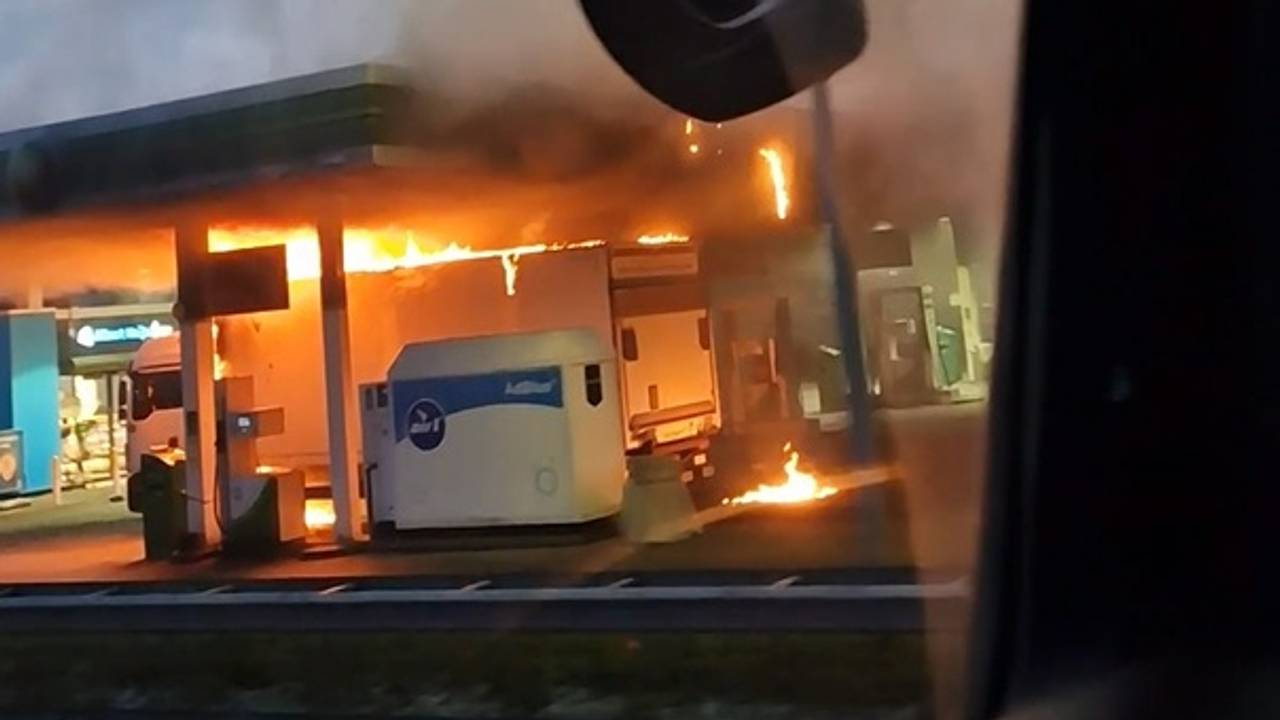 Burning lorry at petrol station along the A59