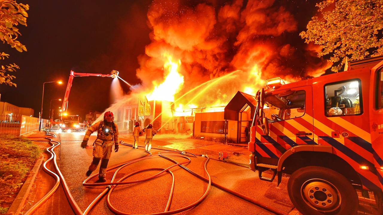 Massive Fire Destroys Thrift Store and Spreads to Neighboring Building