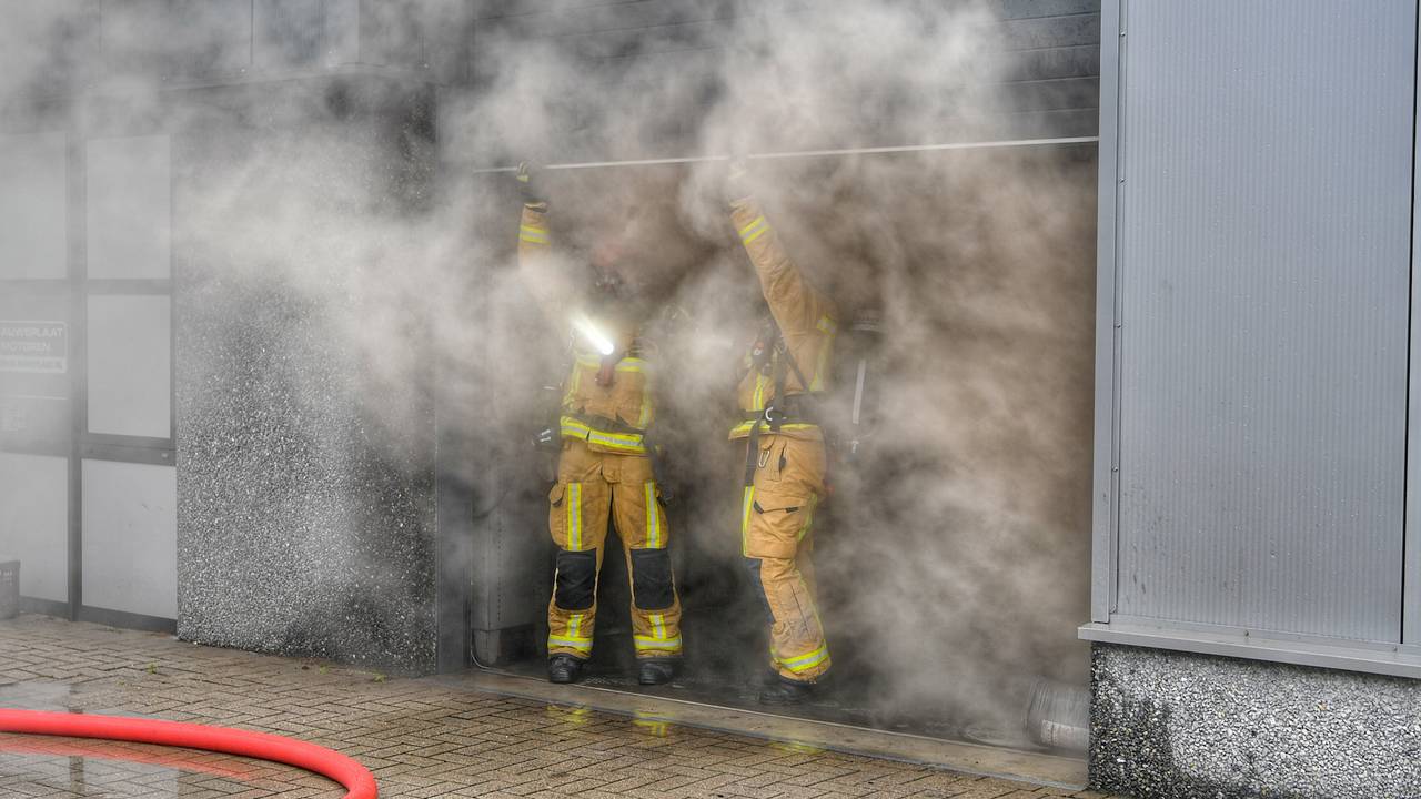 Large Fire Engulfs Motorcycle Shop in Veldhoven, Threatens Multi-Company Building