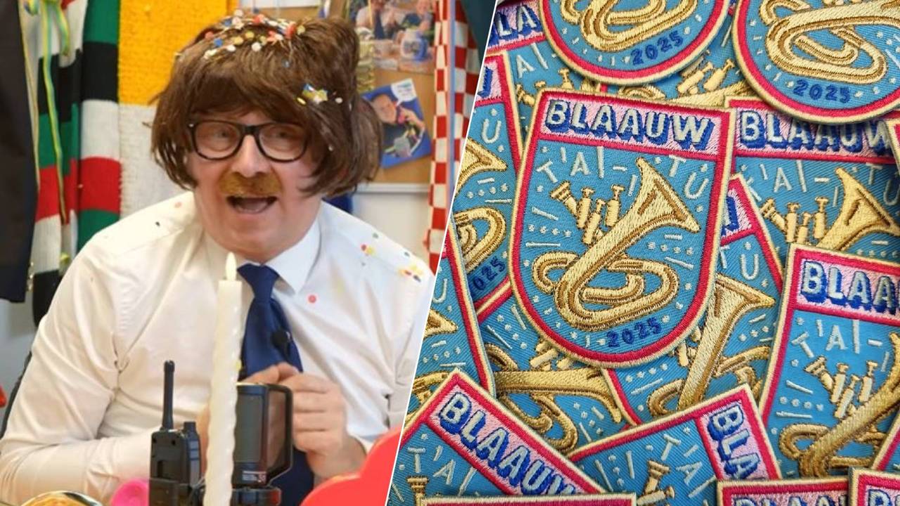 Agent Adrie en het carnavalsembleem van dit jaar.