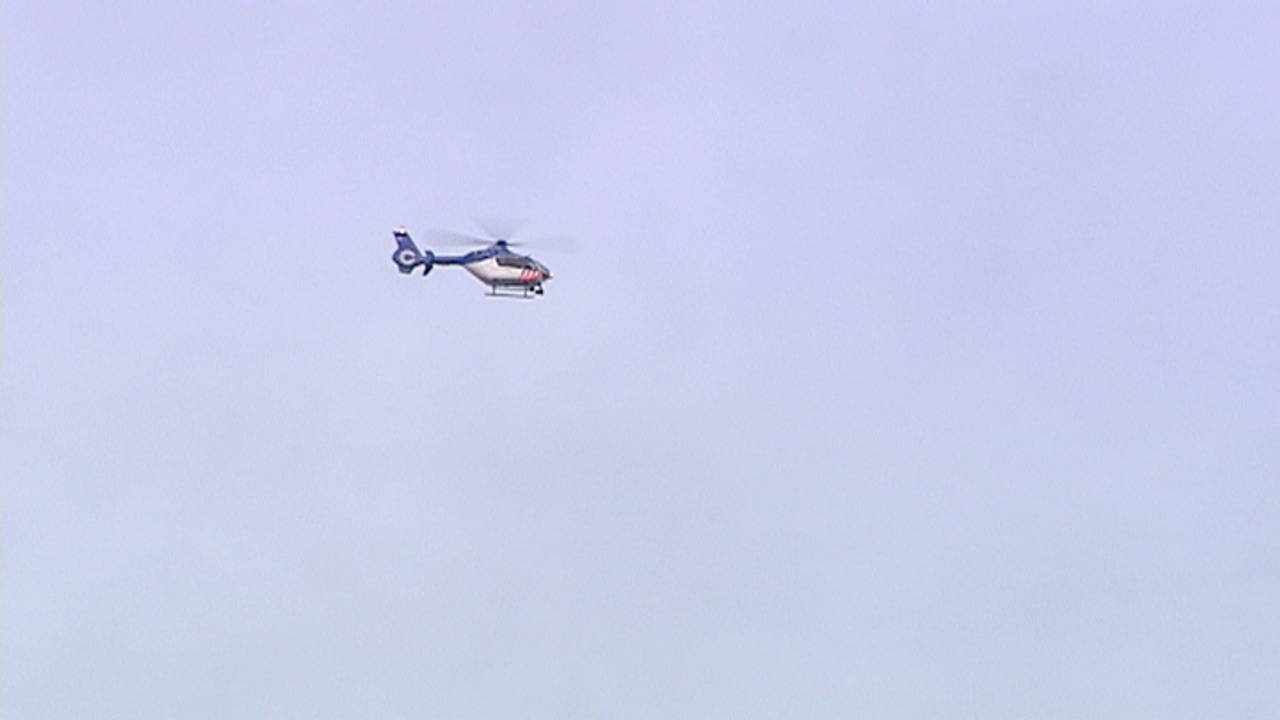 Politiehelikopter boven Woensel.