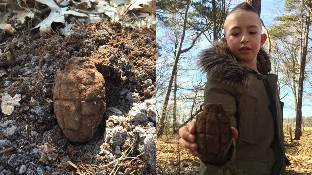 Georgie met zijn gevonden granaat