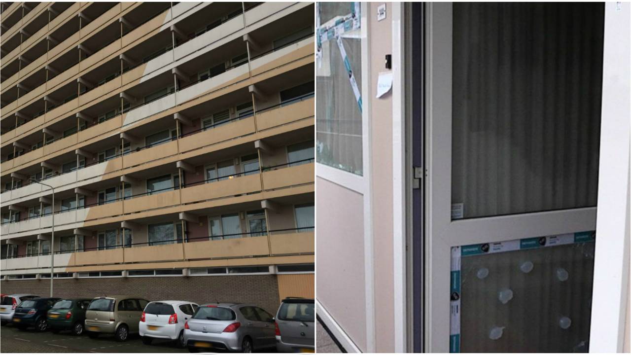 Bij de flat gingen meerdere stenen door de ruiten.