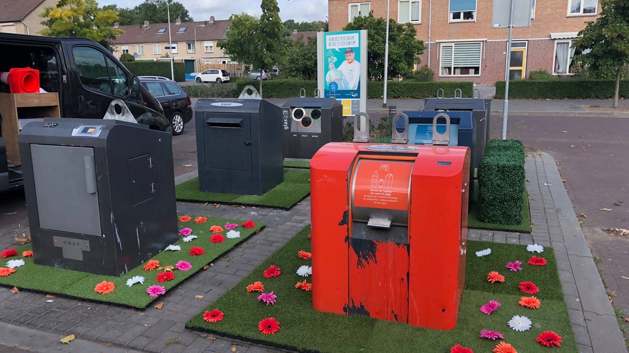 Oss zet afvalcontainers in de bloemetjes