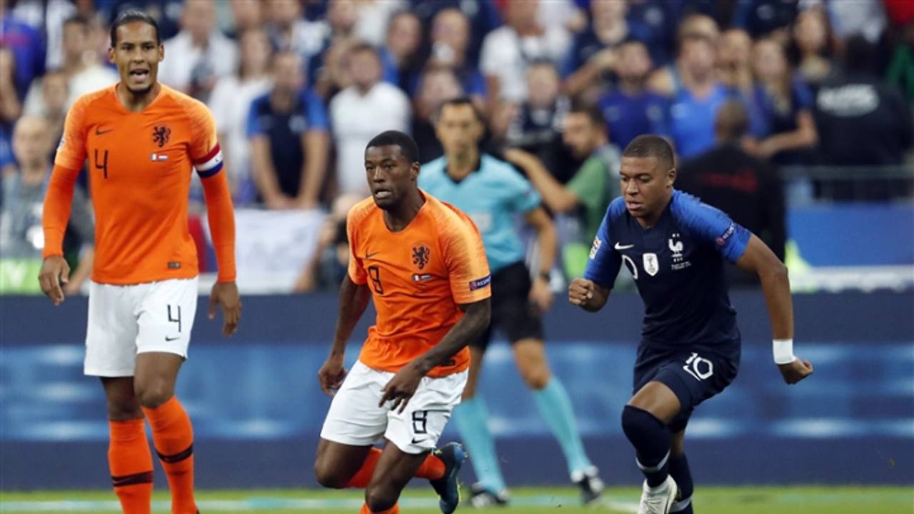 Van Dijk, Wijnaldum en Mbappé. (Foto: VI Images)