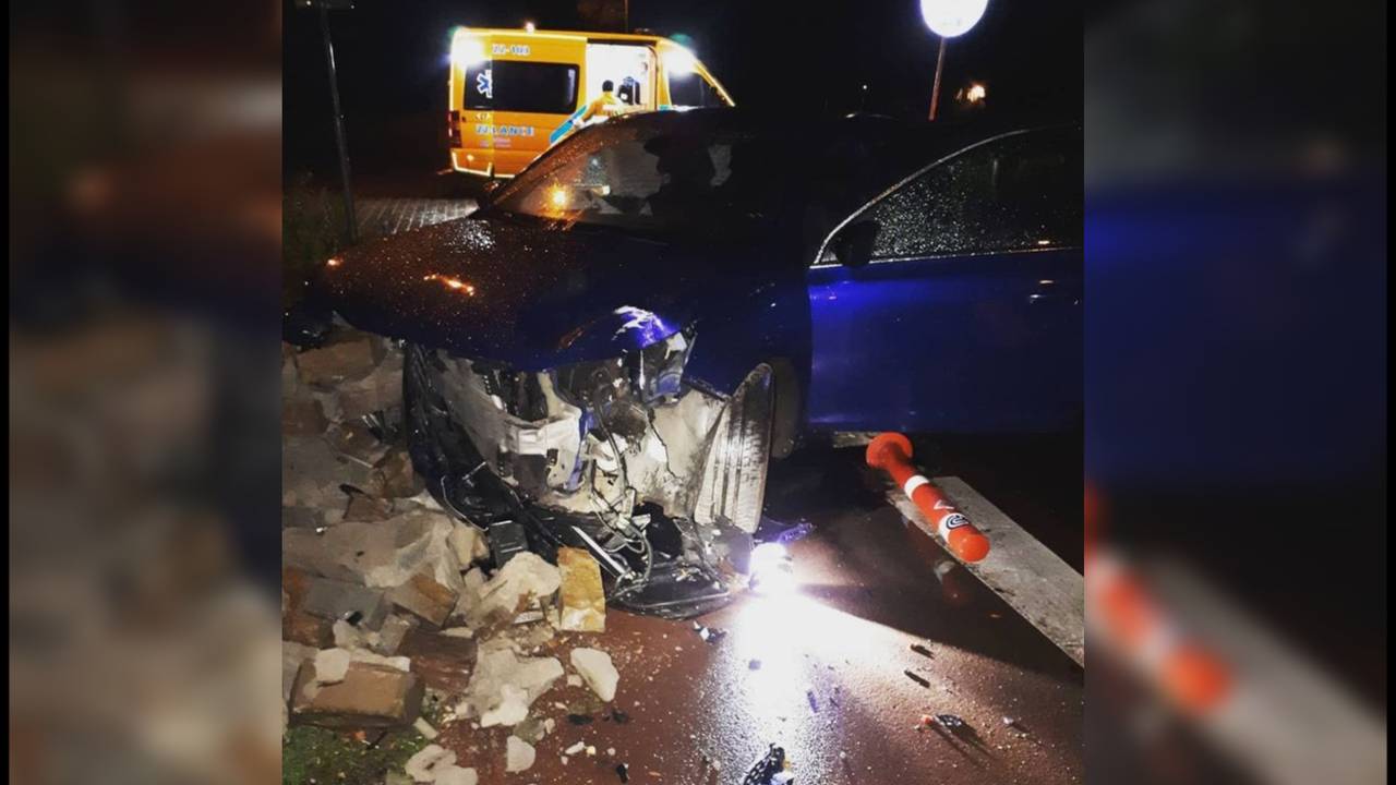 Flinke schade aan de auto (foto: politie Eindhoven/Facebook).