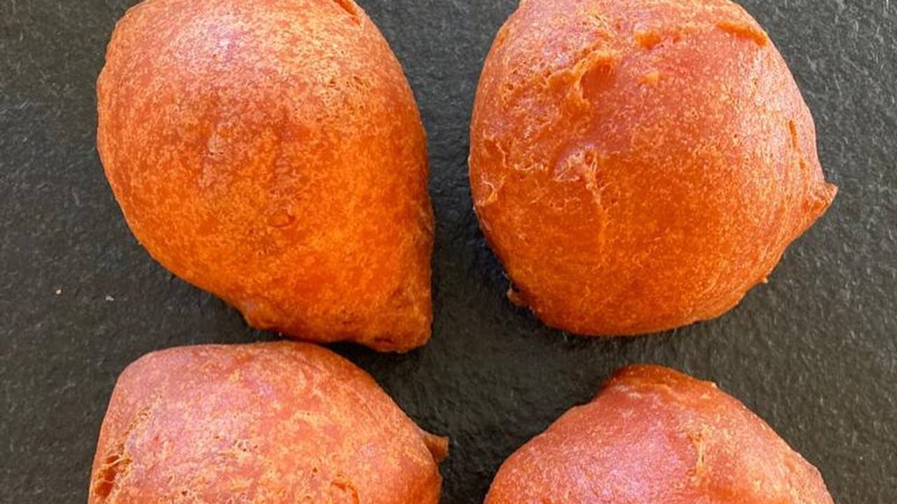 Oranje oliebollen (foto: bakkerij van de mortel).