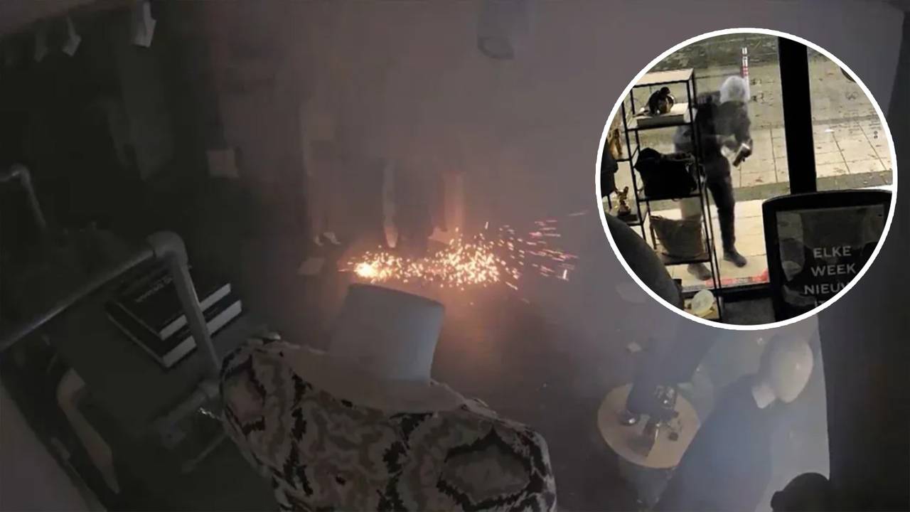 Op de etalage van de kledingwinkel werden meerdere kokers vastgeplakt (foto: Bureau Brabant).