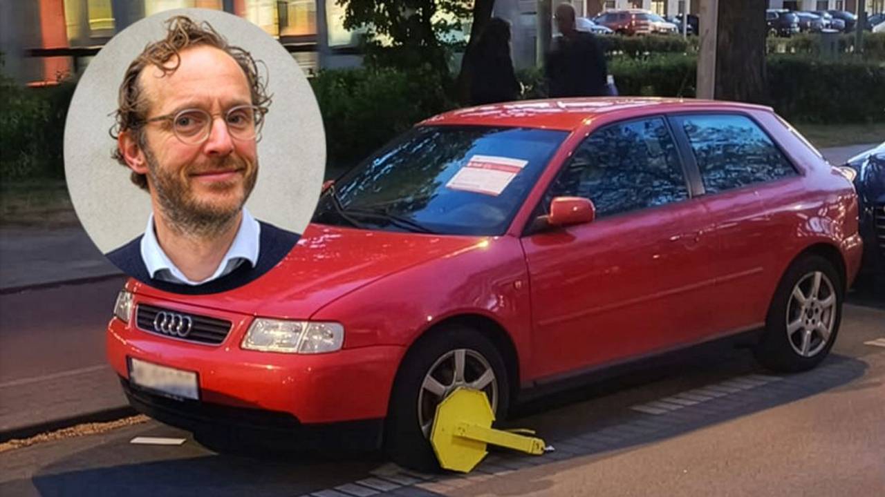 Stijn uit Breda wordt door een fout van de Haagse parkeerdienst platgebeld door mensen met een wielklem (foto: Omroep West).