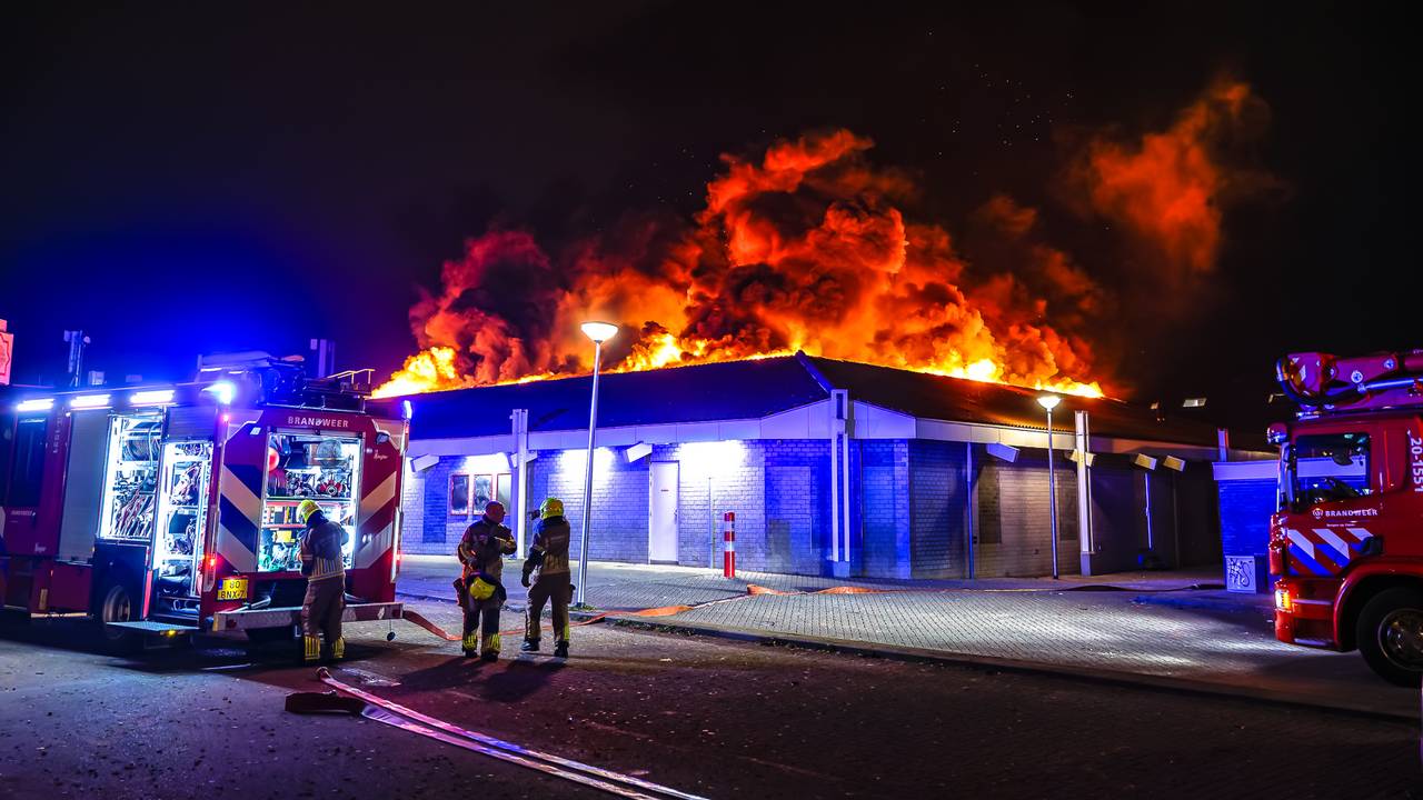 Supermarket Roof Collapses in Devastating Fire: Water Damage Inside