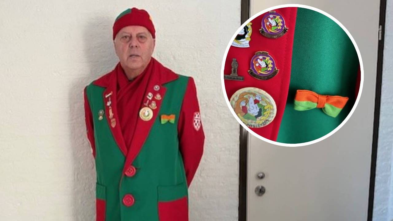 Hans met de strik van Theo op zijn jas (Foto: Hans van Laerhoven)