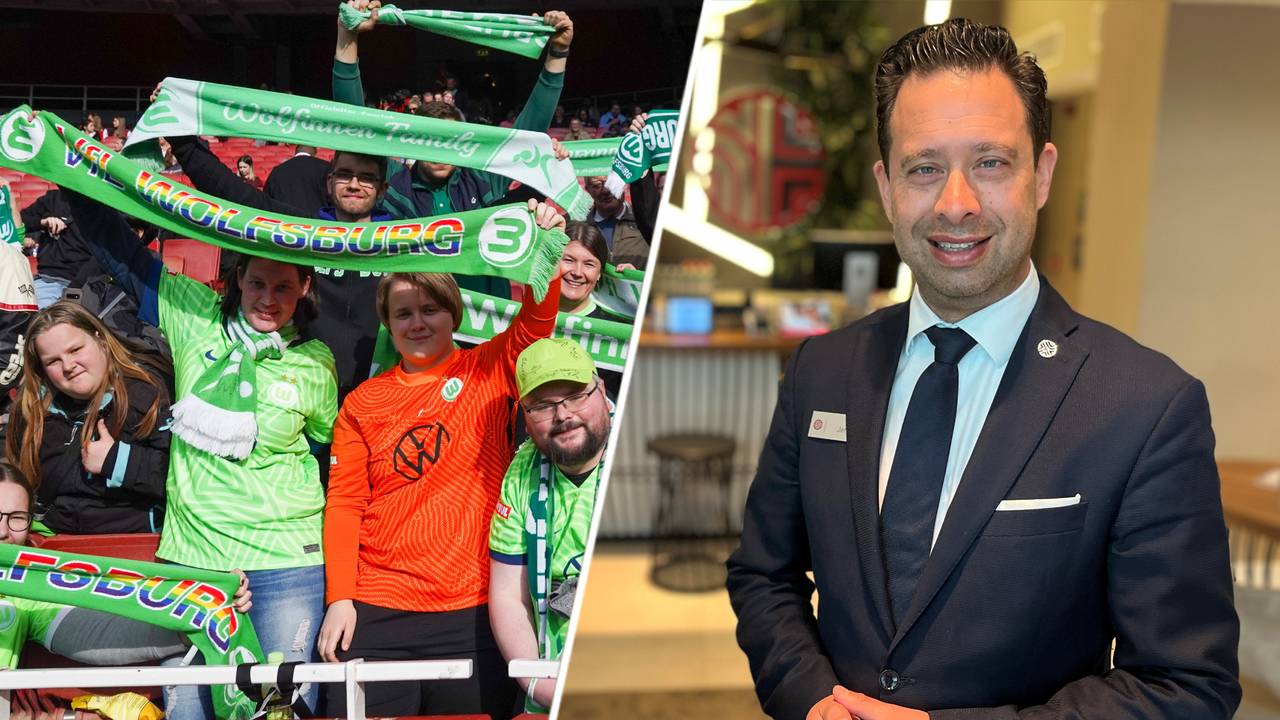 Fans van VfL Wolfsburg en Jeroen Renders van het Eindhovense Hoteliers Overleg (foto: ANP& Rogier van Son).