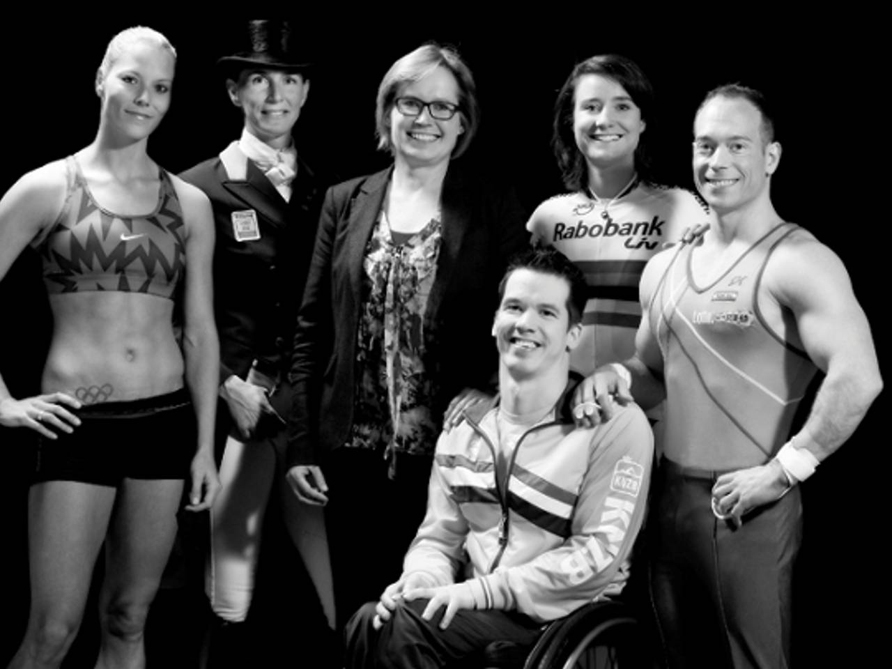 Gedeputeerde Brigite van Haaften met enkele sporters van Team Brabant Sport