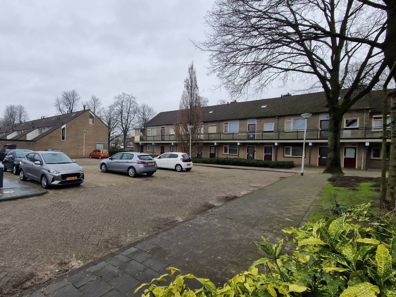 In dit appartementencomplex woonde de buurman. (foto: Noël van Hooft)