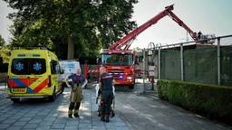 Gewonde schoonmaker kan niet meer naar beneden en ligt in volle zon op dak