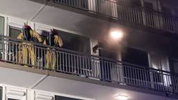 Bewoners van flat moeten halsoverkop hun huis uit na brand