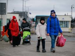 Oekraïense vluchtelingen aan de grens met Polen (Foto: ANP) 