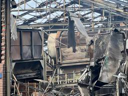 De schade na de brand was enorm (foto: Dave van Hattem).