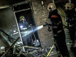 Brand in woonkamer huis Eindhoven (foto: Rob Engelaar)