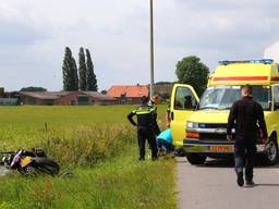 Ambulancepersoneel verleent eerste hulp. (Foto: Charles Mallo/SQ Vision)