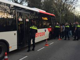 De arrestenten werden afgevoerd met een bus.