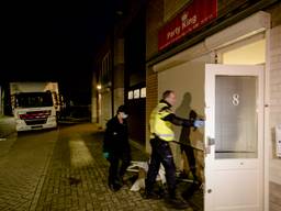 Politieonderzoek op de dag van de inval (foto: ANP)