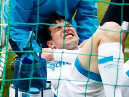 Hirving Lozano blijft hangen in het net na z'n doelpunt. (Foto: VI Images)