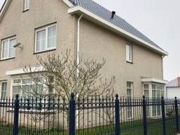 Het huis van de verdachte in Werkendam.