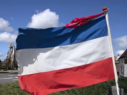 Een voorbeeld van een protestactie met een boerenzakdoek en een omgekeerde Nederlandse vlag, niet in Brabant (foto: ANP).