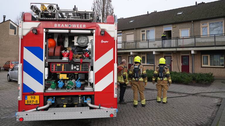 Doorgedraaide buurman sticht brand in zijn eigen appartement