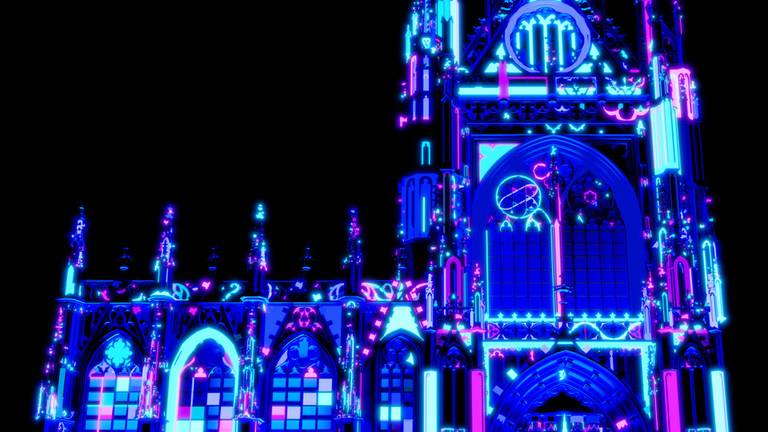 De spectaculair verlichte Sint-Jan (foto: Dirk van Poppel).