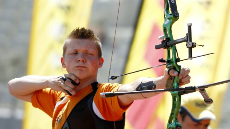 Sjef van den Berg is een van de drie gouden handboogschutters (Foto: ANP)