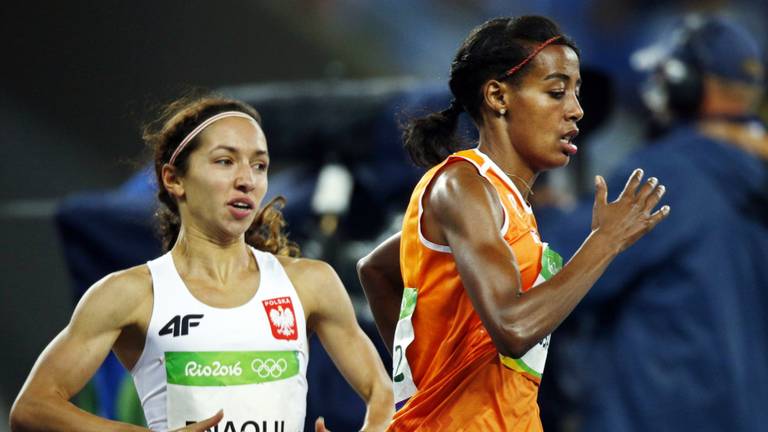 Hassan snelde in de laatste 300 meter iedereen voorbij. (Foto: ANP)