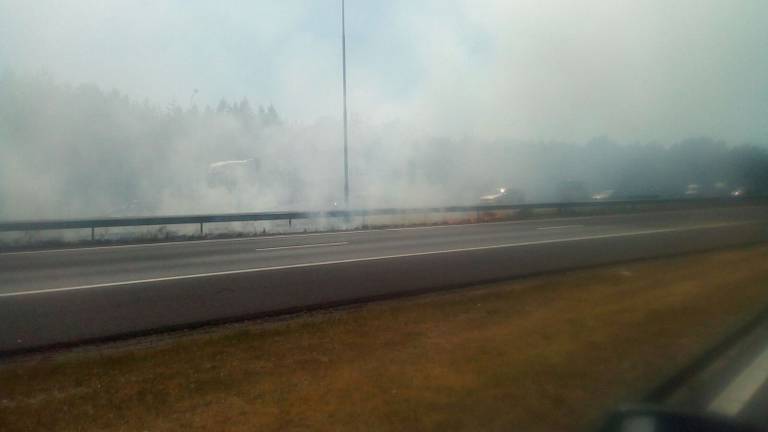 Flinke rook op de A58