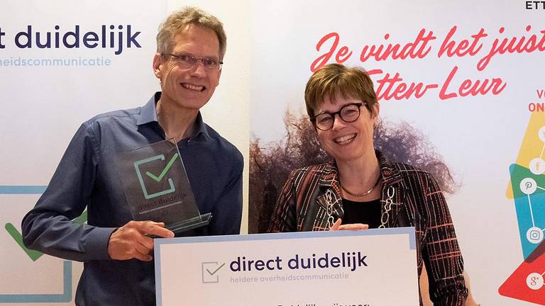 Henk Buesink en burgemeester De Vries van Etten-Leur.