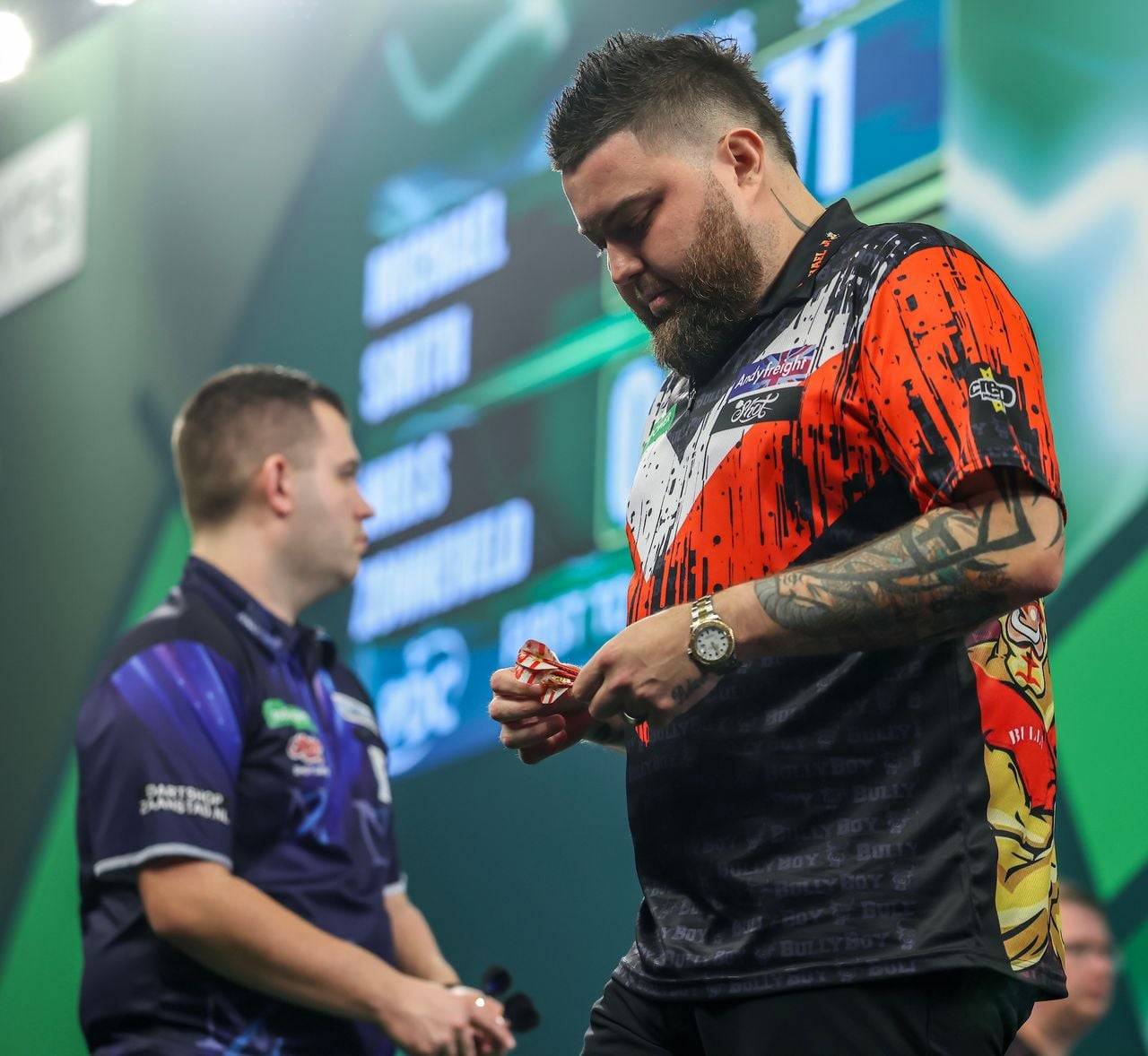 Michael Smith (rechts) was niet opgewassen tegen Niels Zonneveld op het WK darts (foto: PDC).