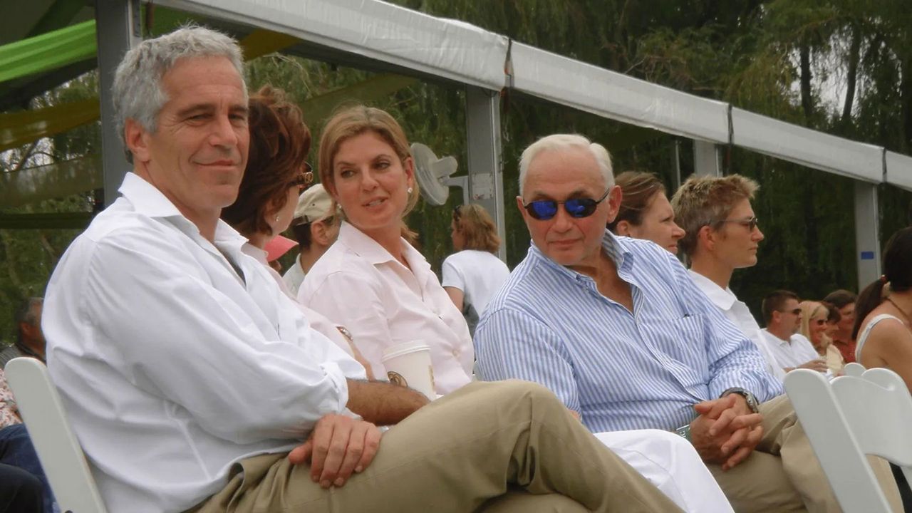 Epstein (left) with businessman Les Wexner - US Department of Justice