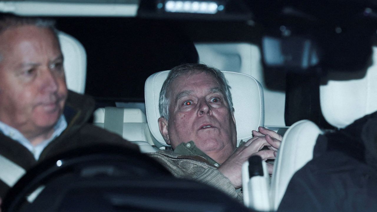 Andrew in the car that picked him up from the police station on Friday - Reuters