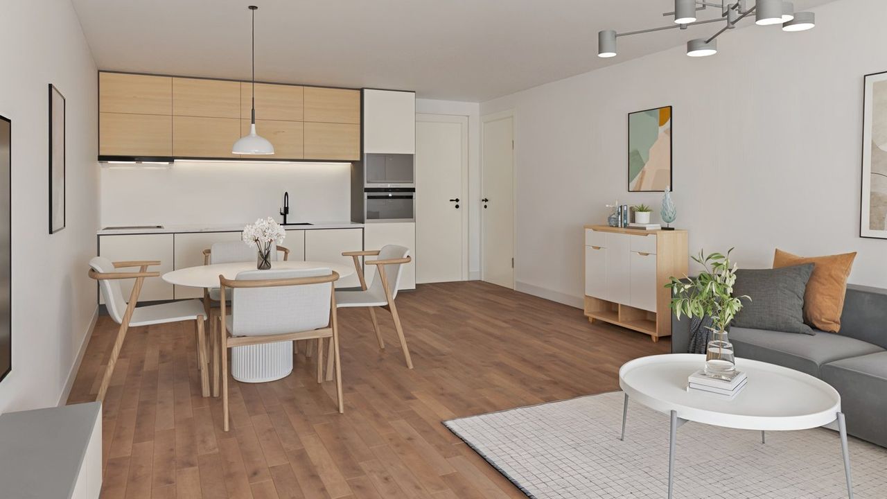 De woonkamer in het appartement (foto: Makelaardij de Leygraaf BV).