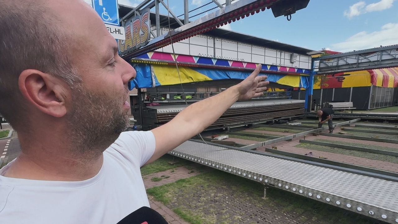 Chris Eckelboom bij zijn attractie, die tegen de achterkant van de cakewalk aan staat (foto: Omroep Brabant).