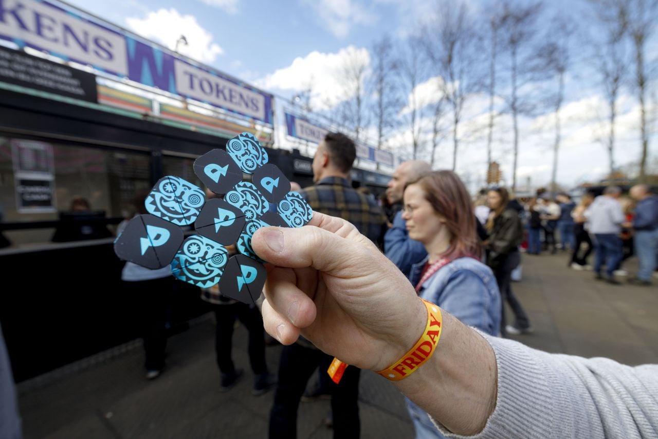 Muntjes voor eten en drinken op Paaspop (foto: ANP).