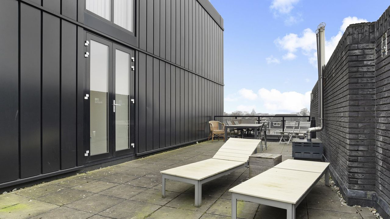 Het gedeelde dakterras (foto: Makelaardij Hendriks).