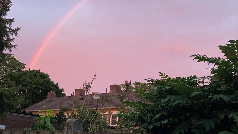 Christine zag een regenboog opdoemen,