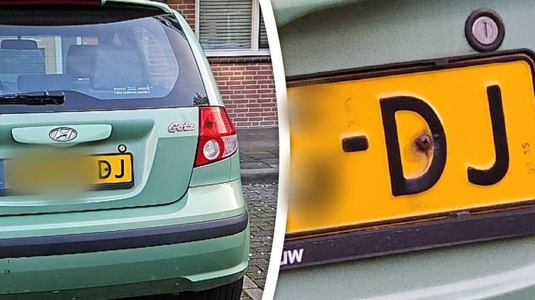 De auto in Breda met een schroef in de D van zijn nummerplaat (foto: RTV Rijnmond).