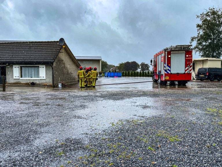 Wateroverlast door een verstopte riolering (foto: Harrie Grijseels/SQ Vision).