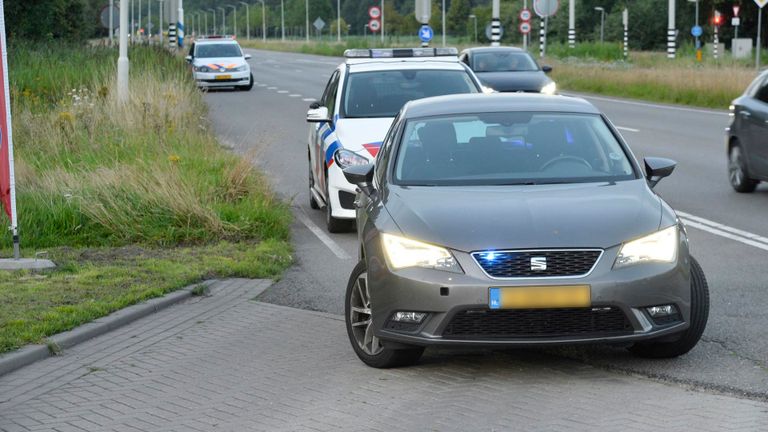 De man werd door agenten uit de auto 'gepraat'(foto: Perry Roovers/SQ Vision).