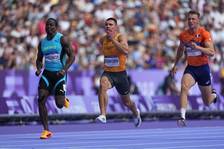 Sven Roosen (rechts) sterk op de 100 meter (foto: ANP 2024/Michael Kappeler DPA).